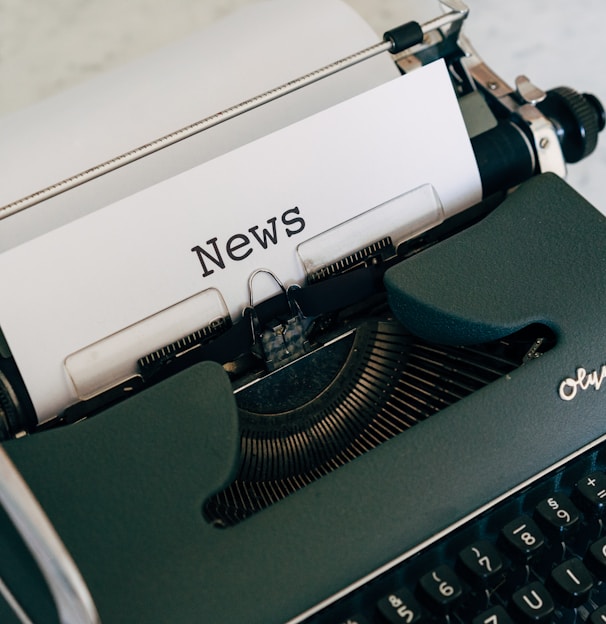 a close up of an old fashioned typewriter