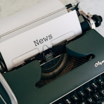 a close up of an old fashioned typewriter