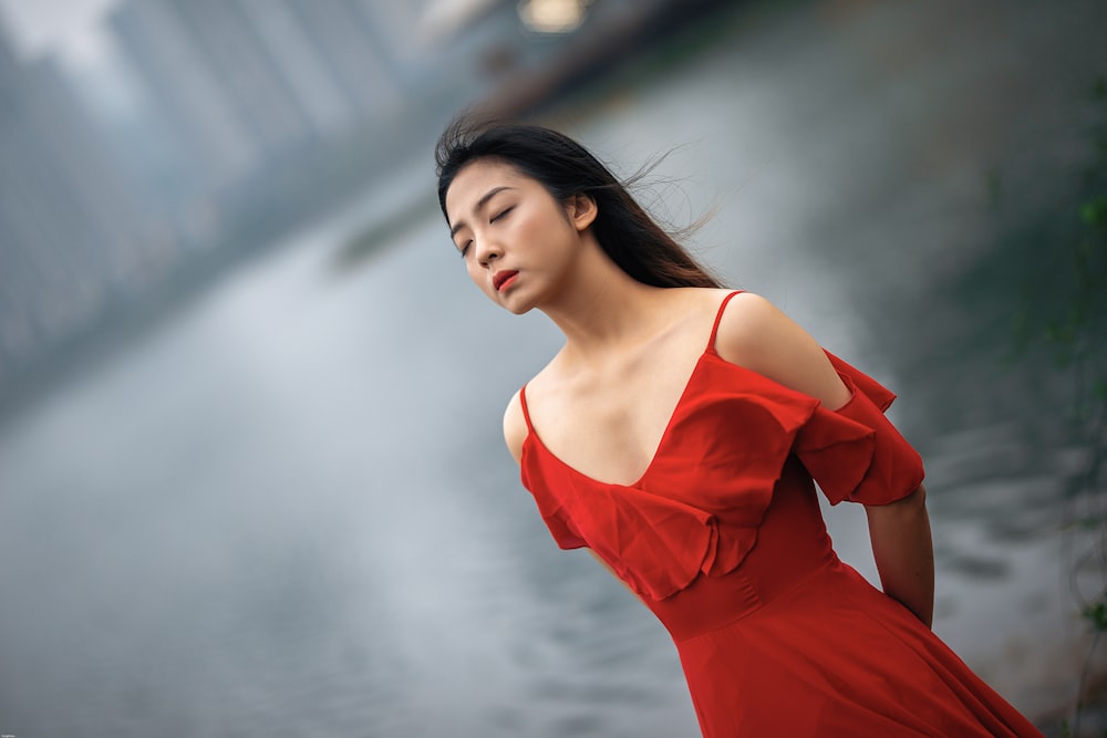 woman in red v neck dress