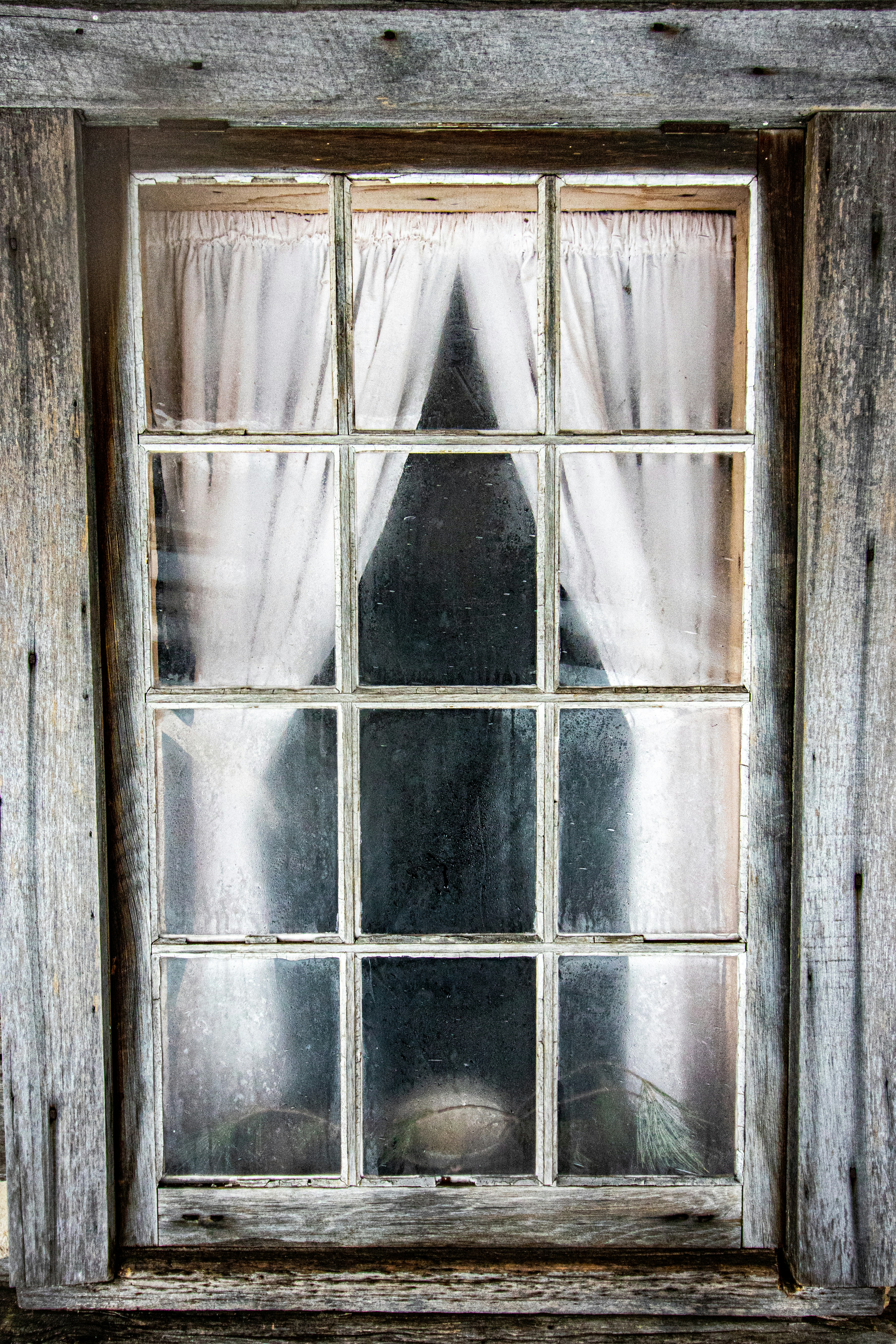 white wooden framed glass window