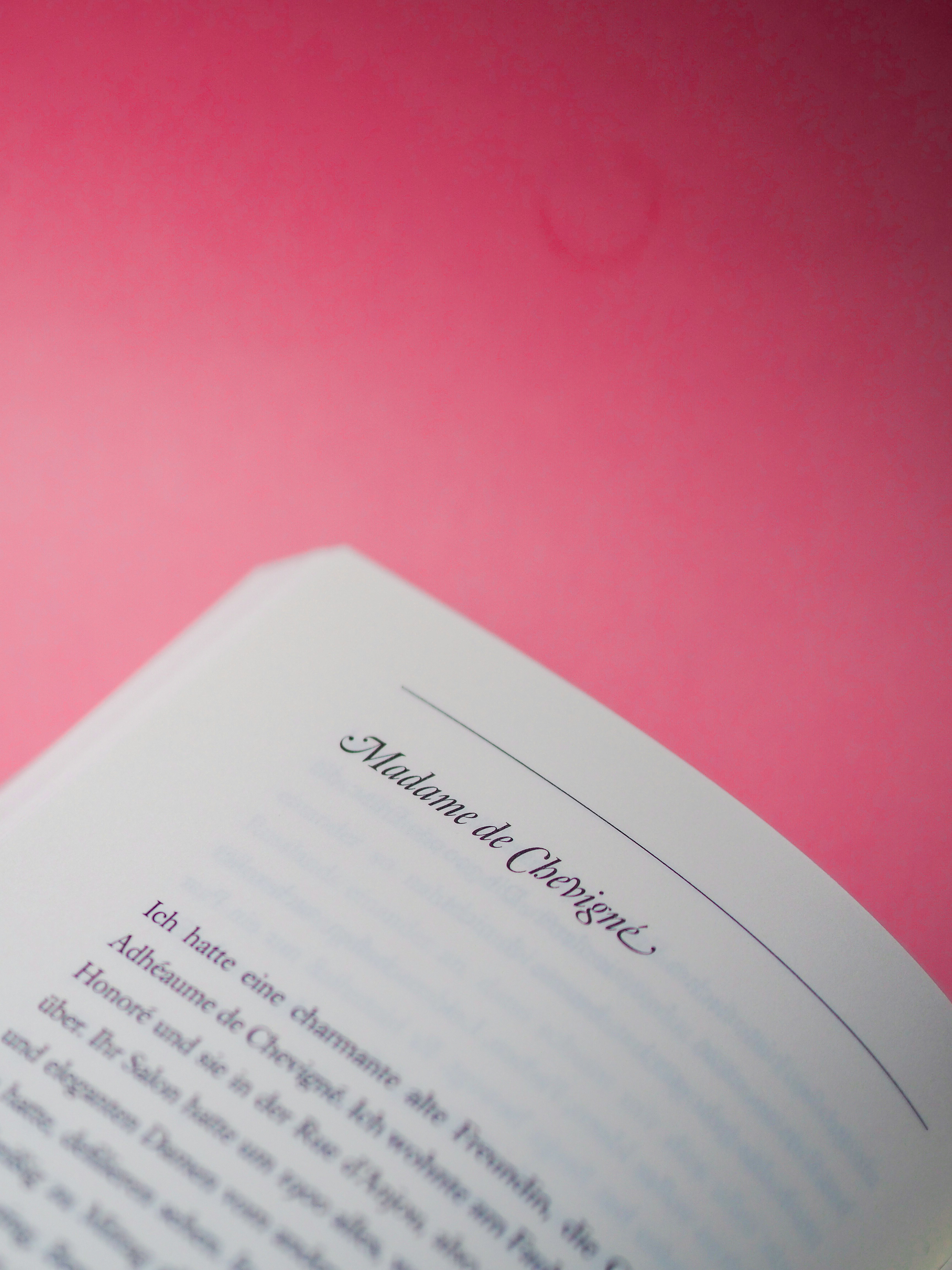 white printer paper on pink textile