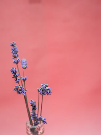 Elegant resin art piece with soft lavender and gold accents on a minimalist white background.