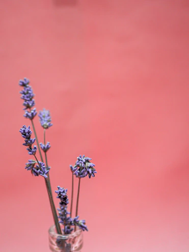Elegant resin art piece with soft lavender and gold accents on a minimalist white background.