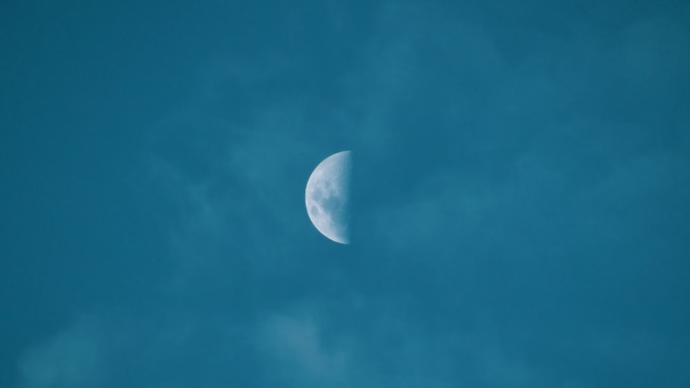 full moon in blue sky