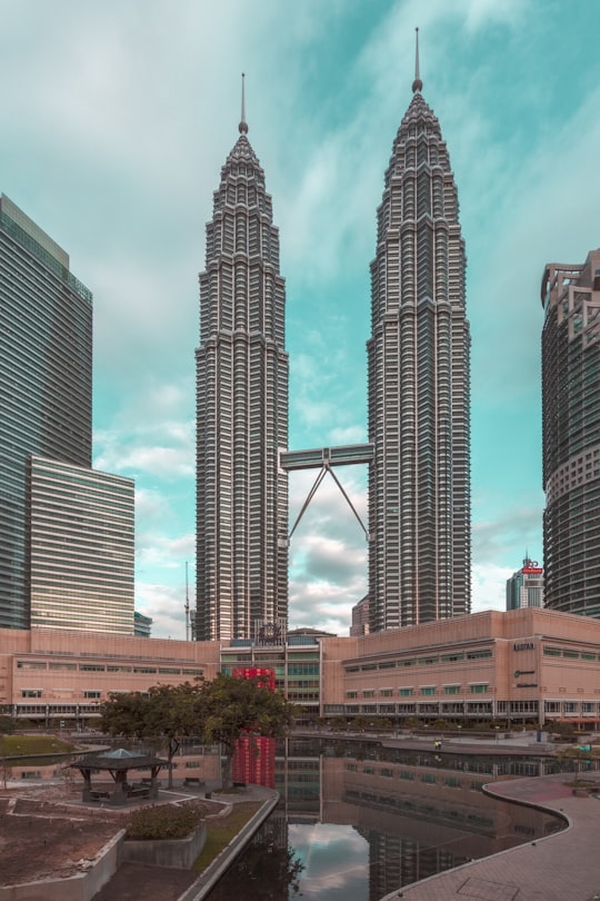 city buildings under blue sky during daytime in KLCC Park Malaysia