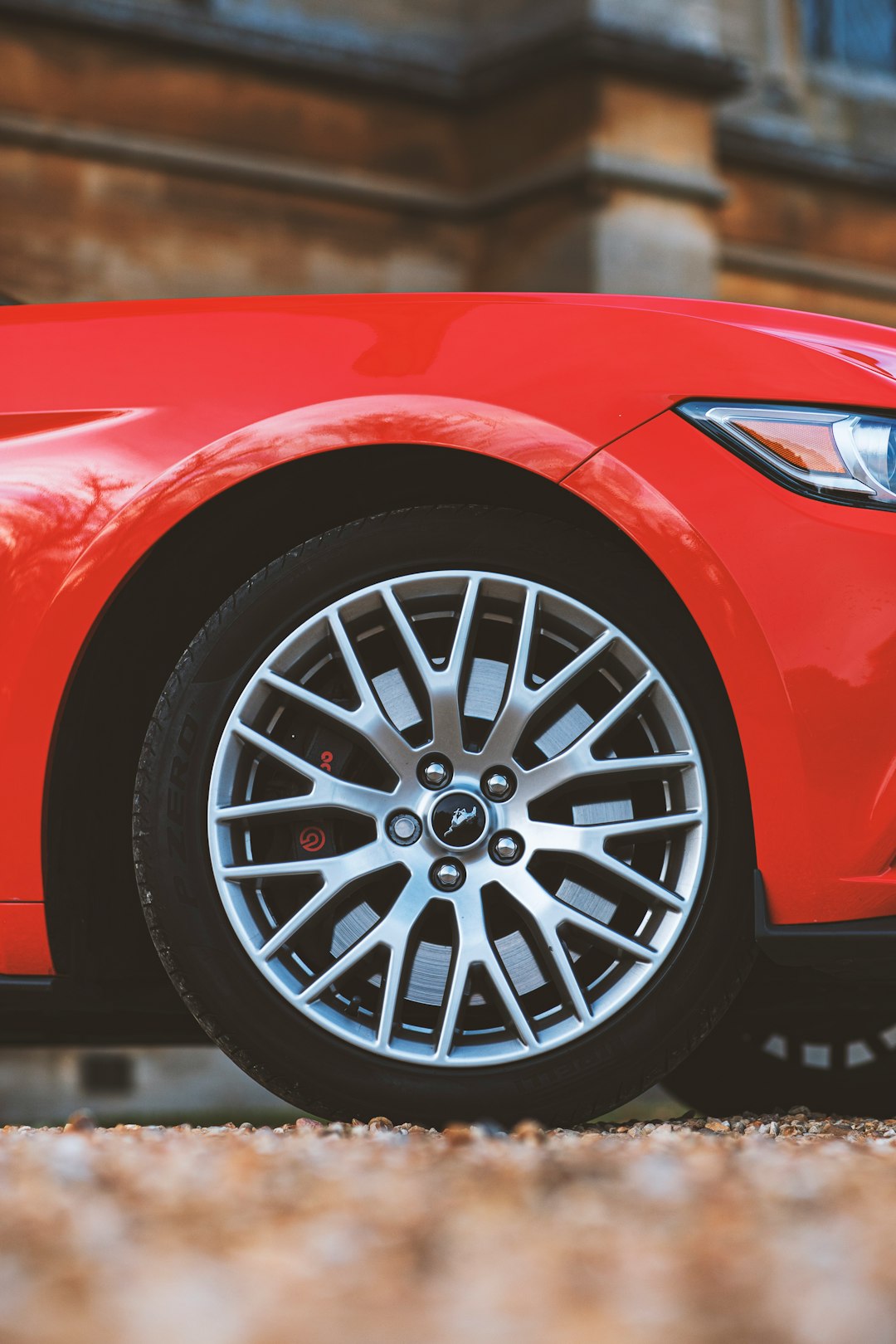 red car with silver wheel