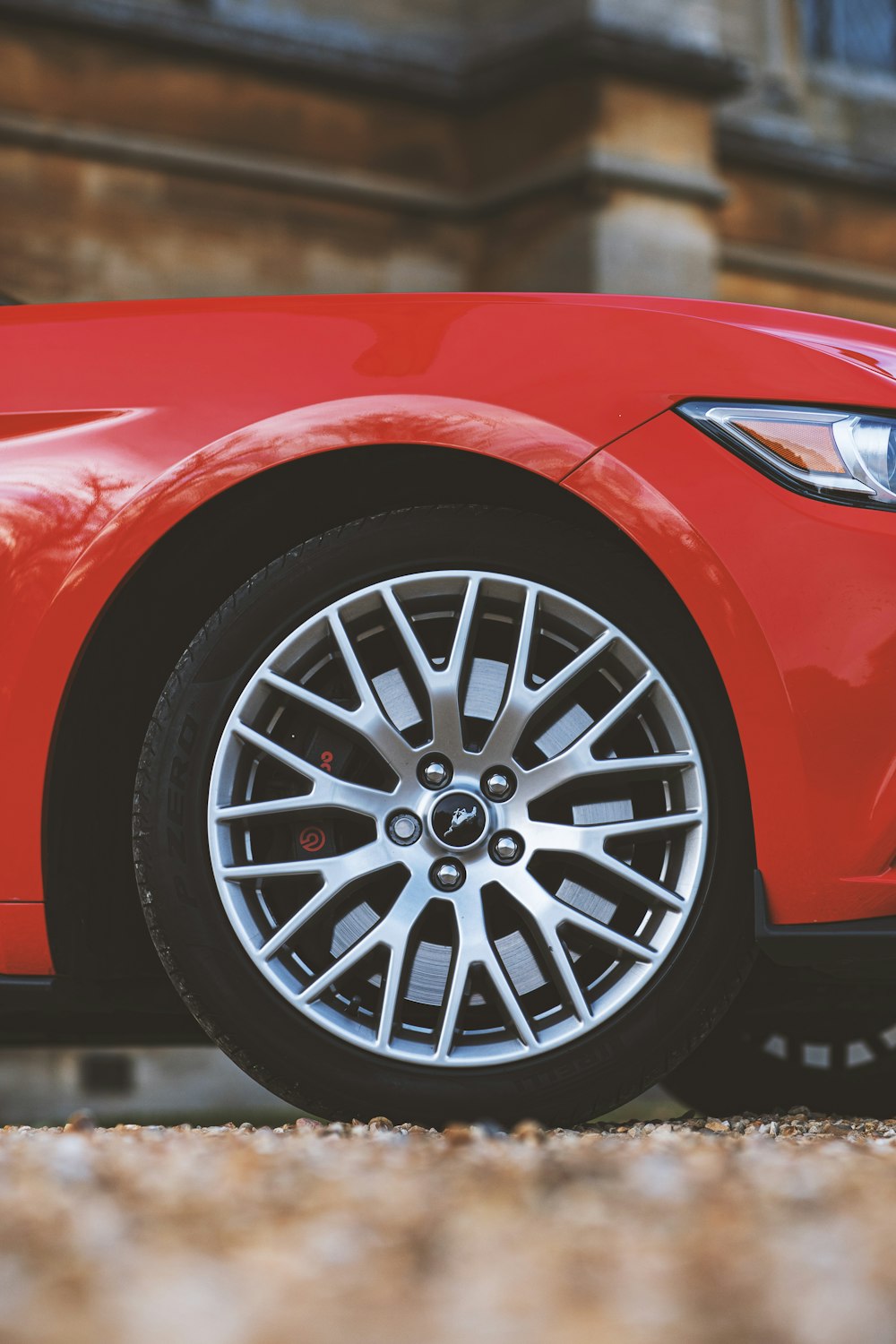 red car with silver wheel