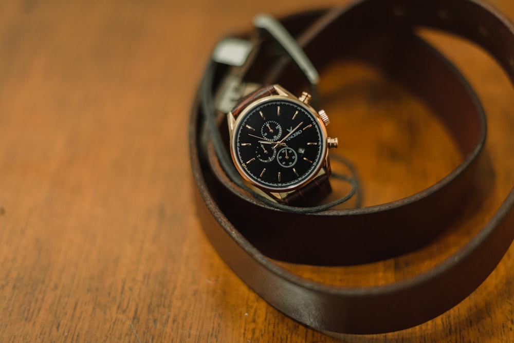 black and silver round chronograph watch