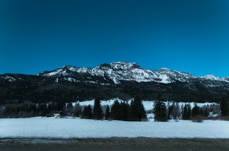 A serene snow-covered mountain landscape, showcasing nature's beauty.