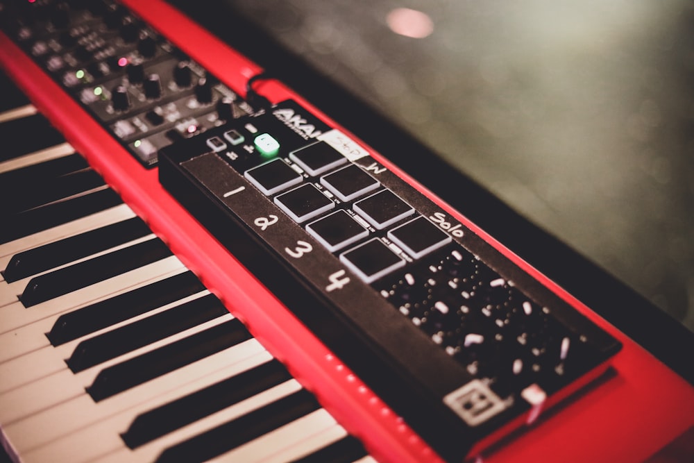 red and black electric keyboard