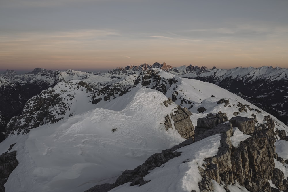 snow covered mountain during daytime