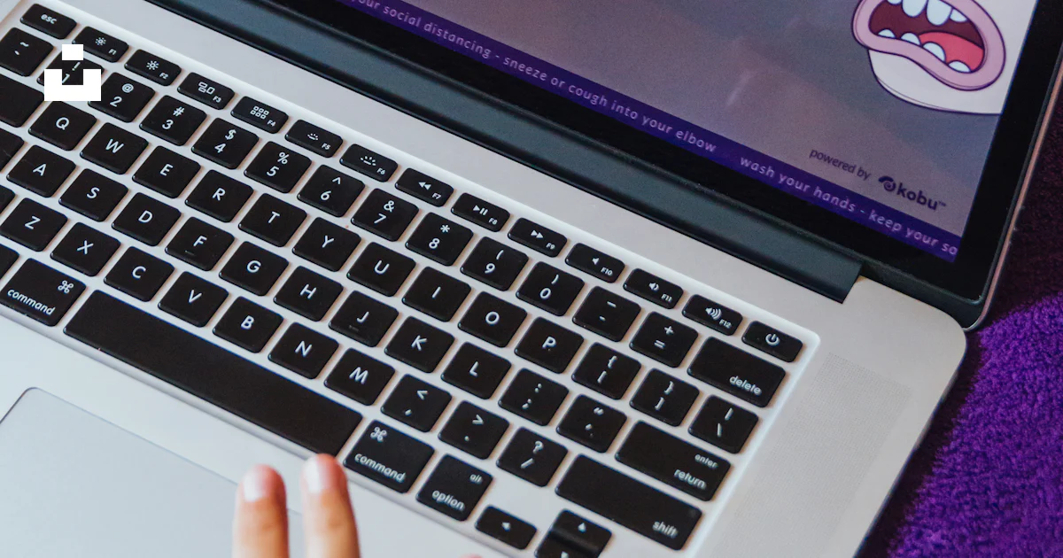 Macbook pro displaying cartoon character photo – Free Kobu creative ...