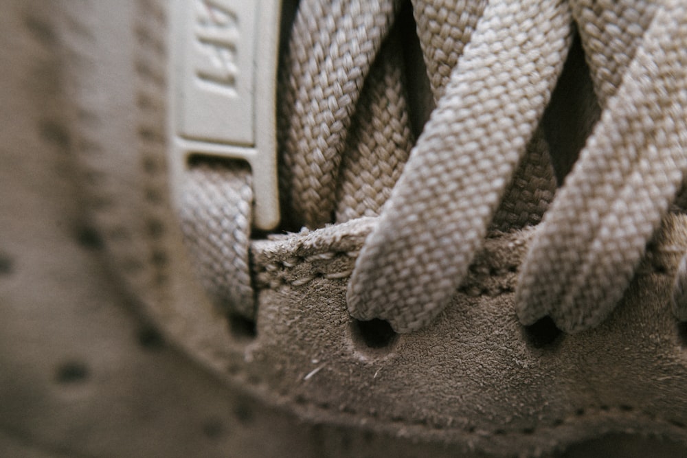 gray and white adidas shoe