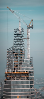 gray metal tower under gray sky