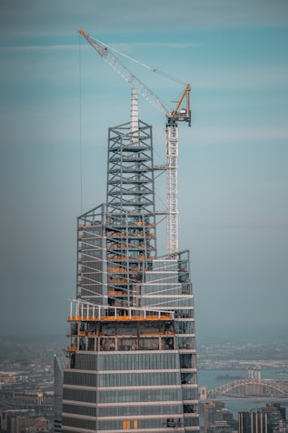 gray metal tower under gray sky