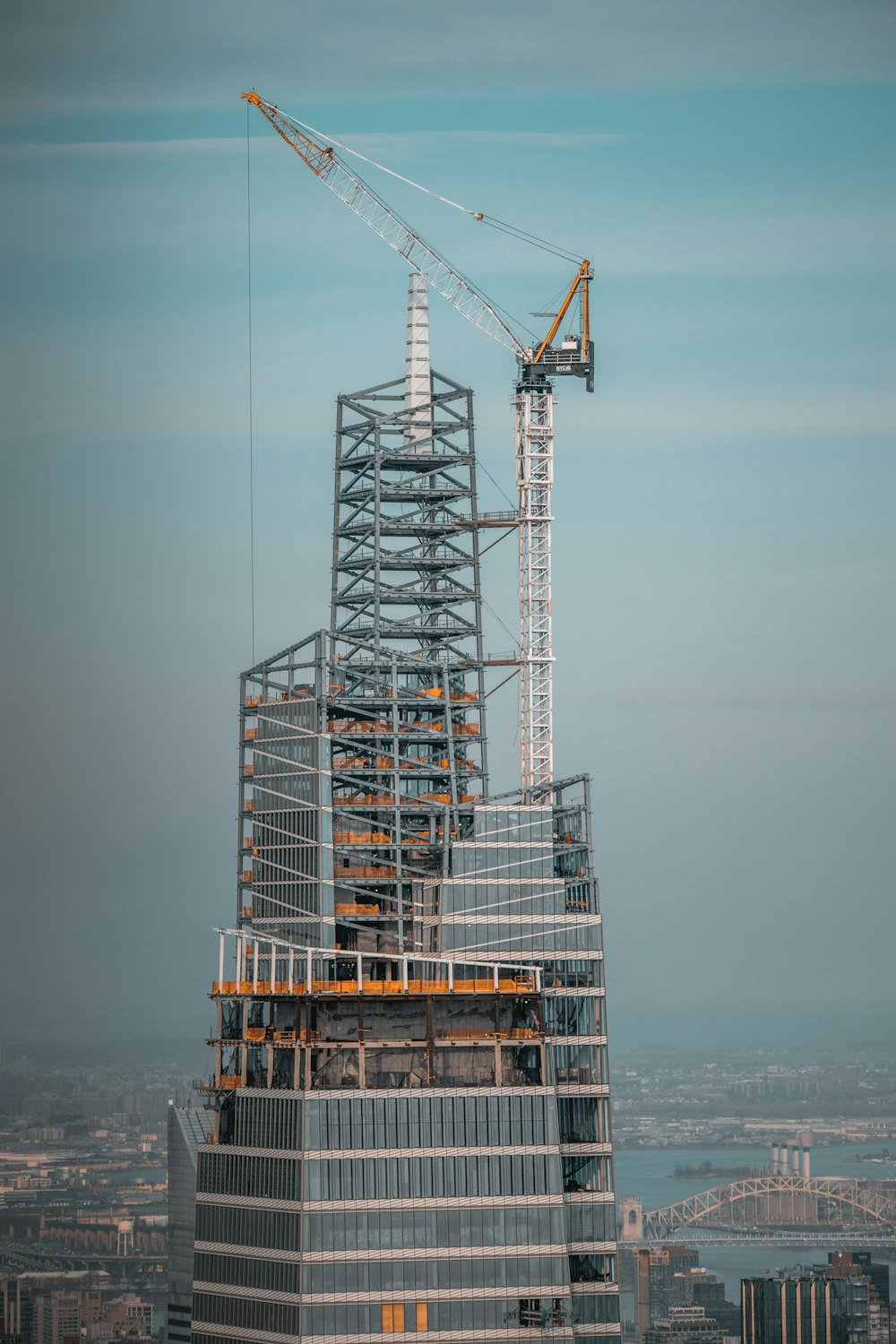 gray metal tower under gray sky