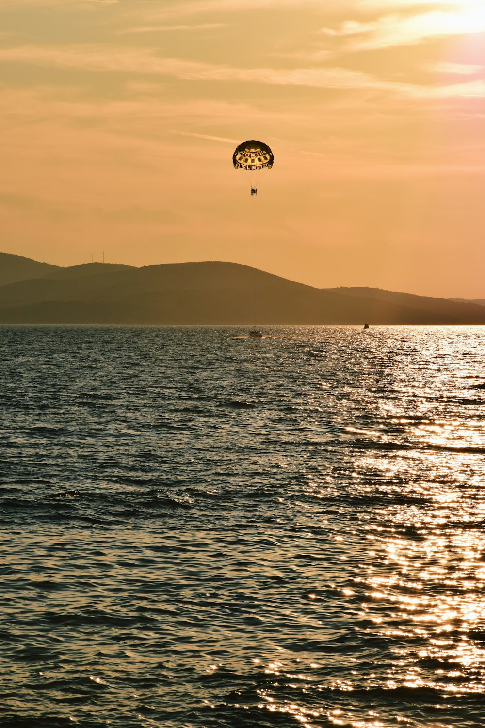 body of water during sunset