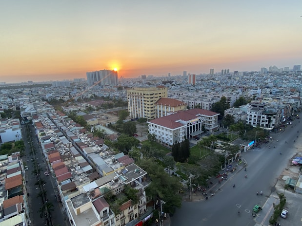 A vibrant aerial view of Mulund’s residential skyline at sunset.