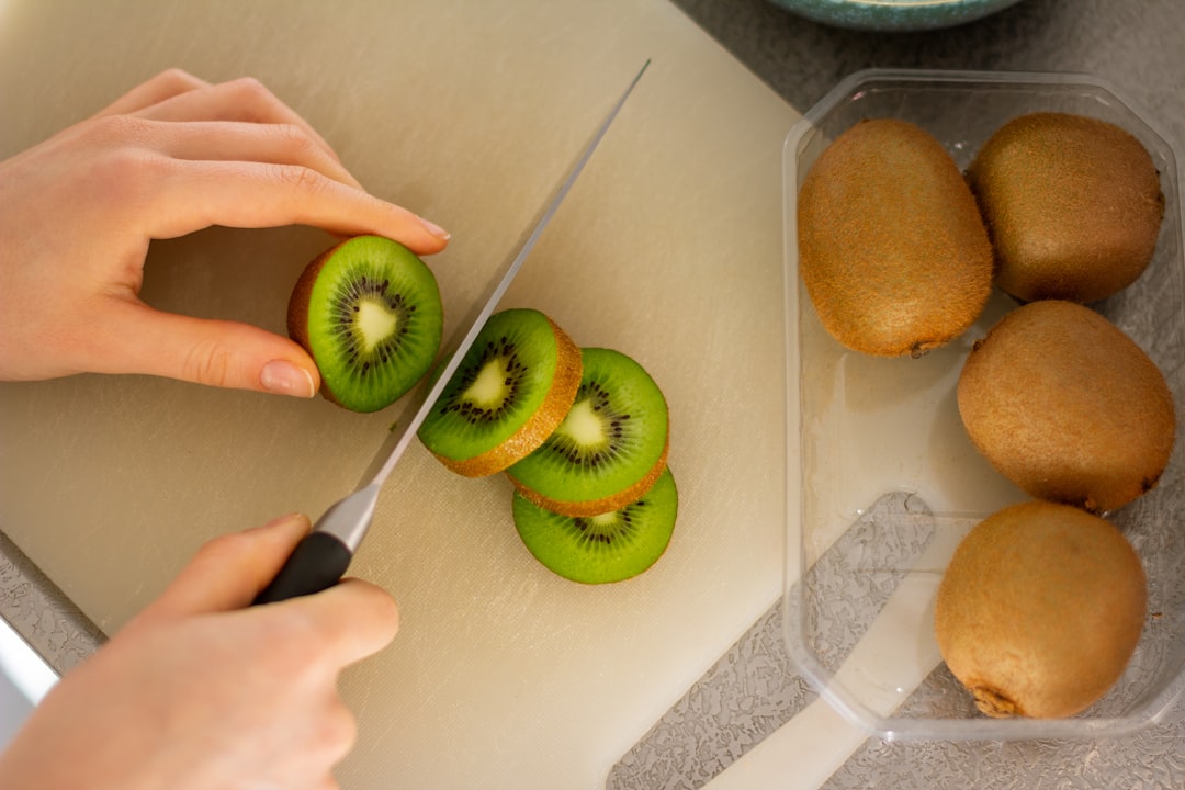 green apple fruit on white table