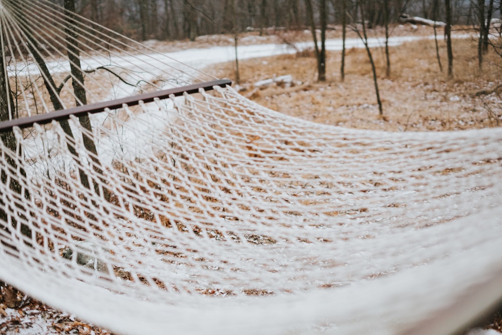 white net on brown field during daytime