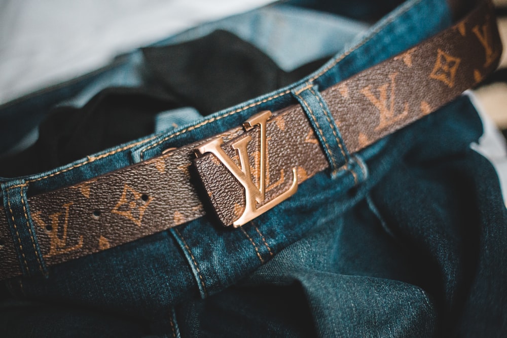 blue denim jeans with black belt