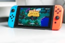 blue nintendo switch game console