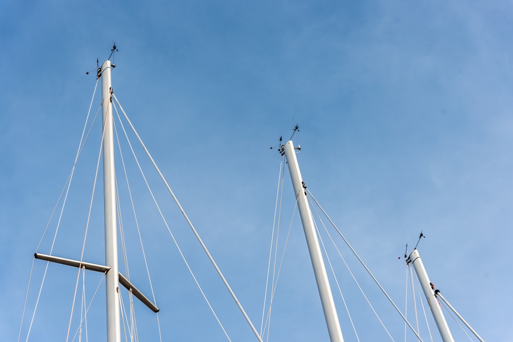 white wind turbines under blue sky during daytime