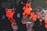 A world map highlighting various regions with large red circles, likely representing data points or incidents across different continents. The dark background makes the red circles stand out prominently, with labels for continents and oceans visible.