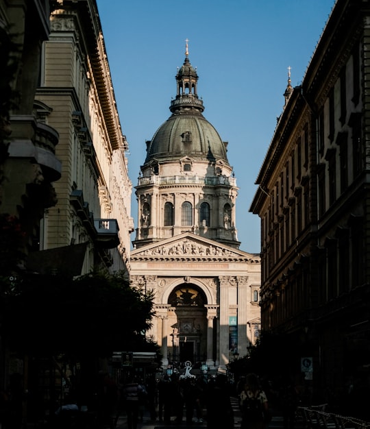 white and brown concrete building during daytime in St. Stephen's Basilica Hungary