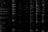 A collection of old, leather-bound books with ornate detailing and faded text is aligned vertically. The titles suggest they are written in Portuguese, with references to exercises of perfection and Ignatian texts. The texture of the leather and the aged appearance of the books convey a sense of history.