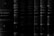 A collection of old, leather-bound books with ornate detailing and faded text is aligned vertically. The titles suggest they are written in Portuguese, with references to exercises of perfection and Ignatian texts. The texture of the leather and the aged appearance of the books convey a sense of history.