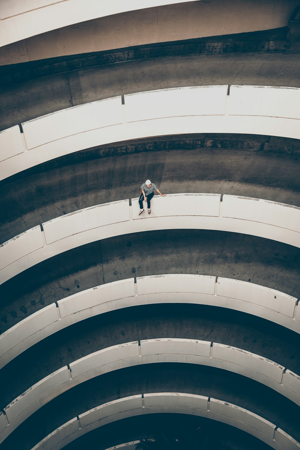 a man standing on top of a tall building