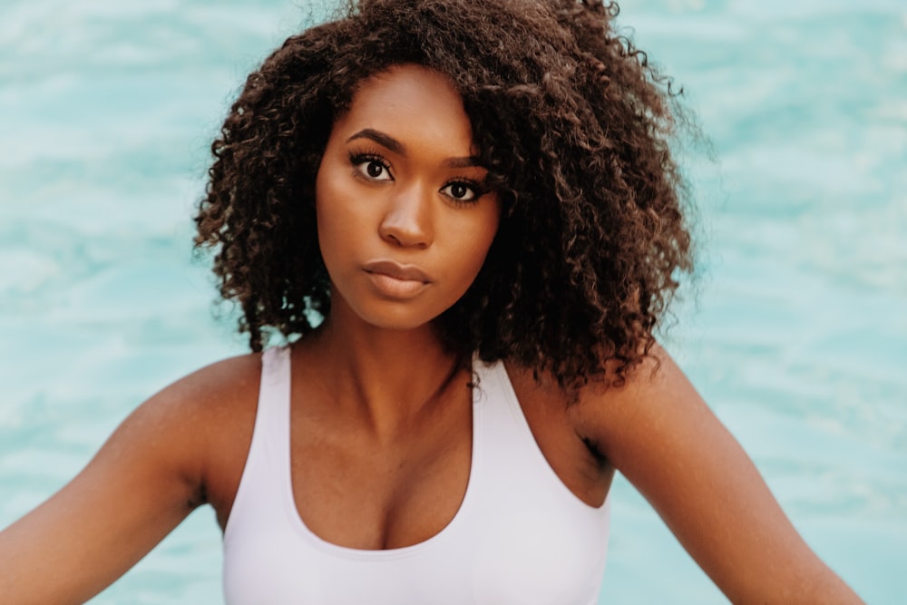 woman in white tank top