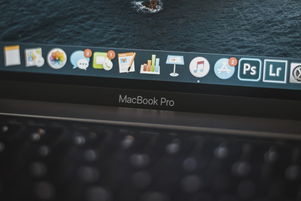 black lenovo laptop computer turned on displaying icons