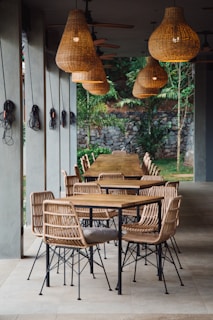 brown wicker chairs and table
