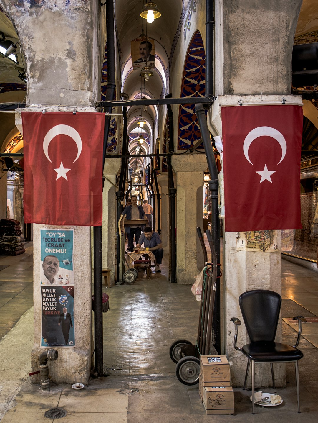 red and white flag on black metal pole