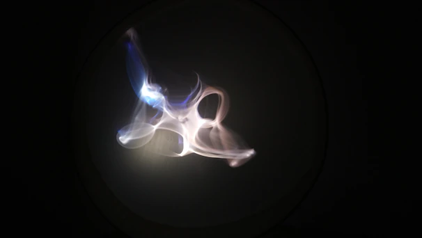 Mystical numbers and symbols softly illuminated against a dark cosmic background.