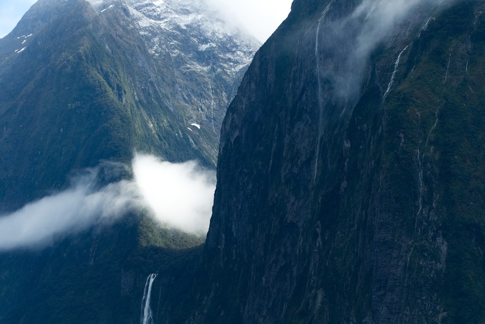 black and gray mountains under white clouds during daytime