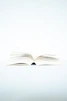 white book page on black surface