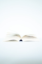white book page on black surface