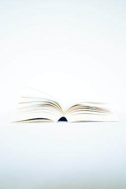 white book page on black surface