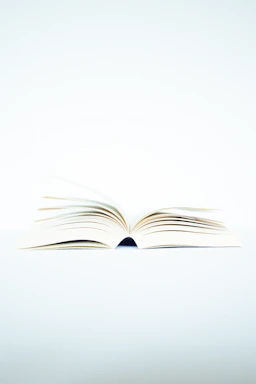 white book page on black surface
