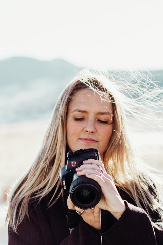 Donna Styles holding a camera