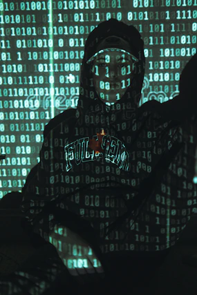 man in black hoodie standing