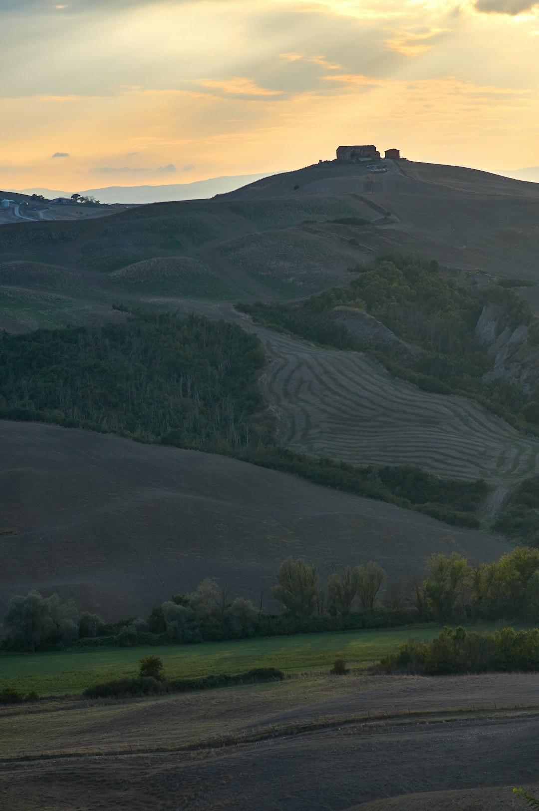 green grass field and mountain during daytime