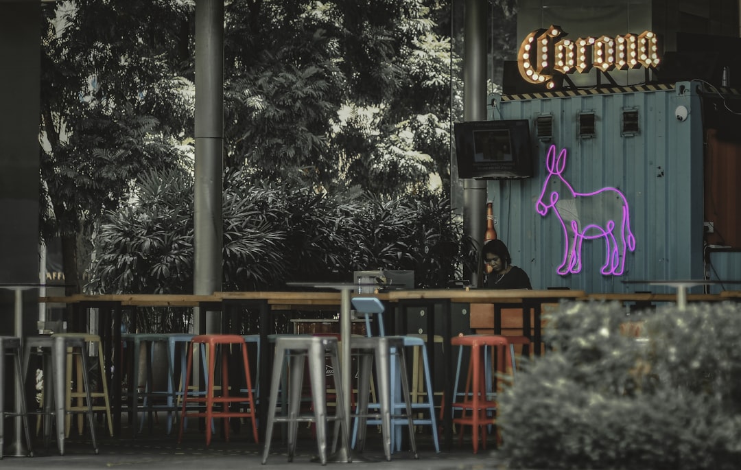 brown wooden table and chairs, Empty bar called