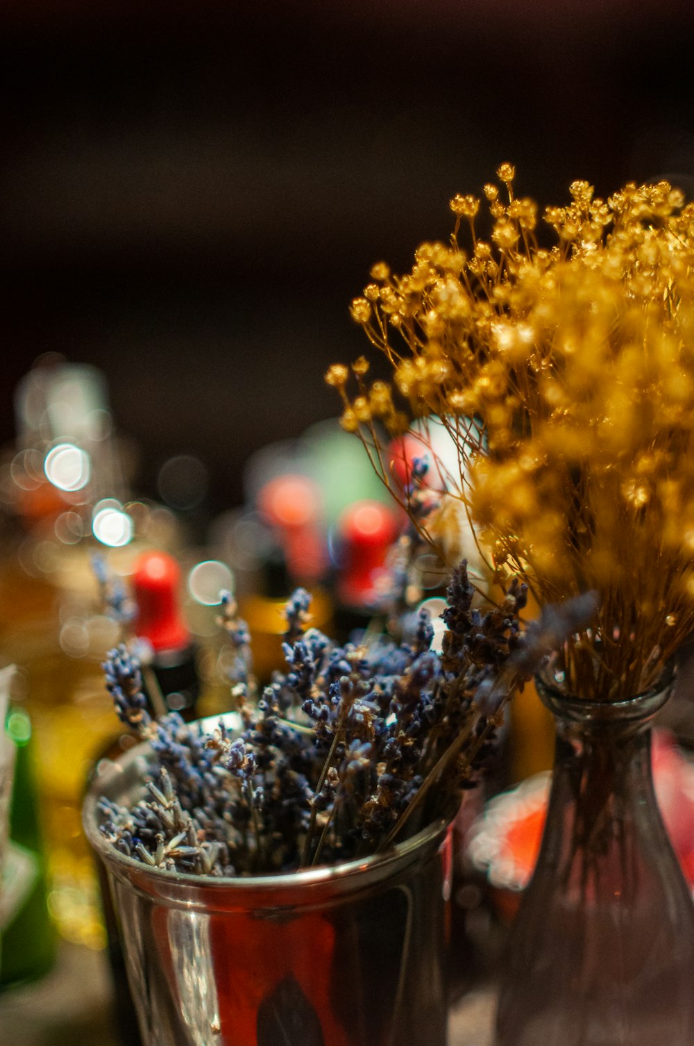 yellow flowers in clear glass vase