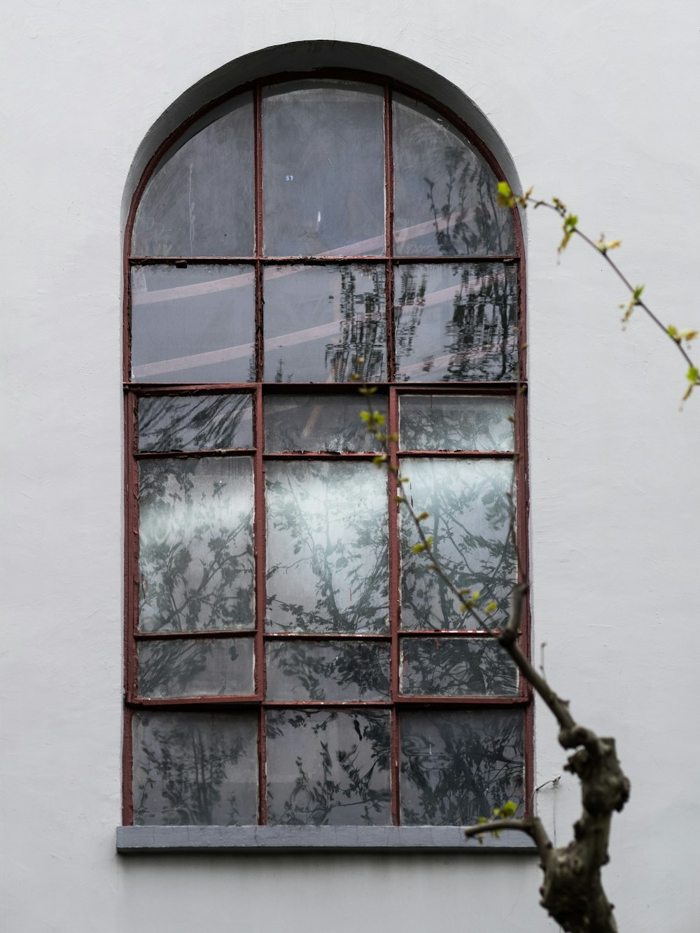 brown wooden framed glass window