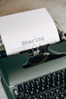 green and white braille typewriter