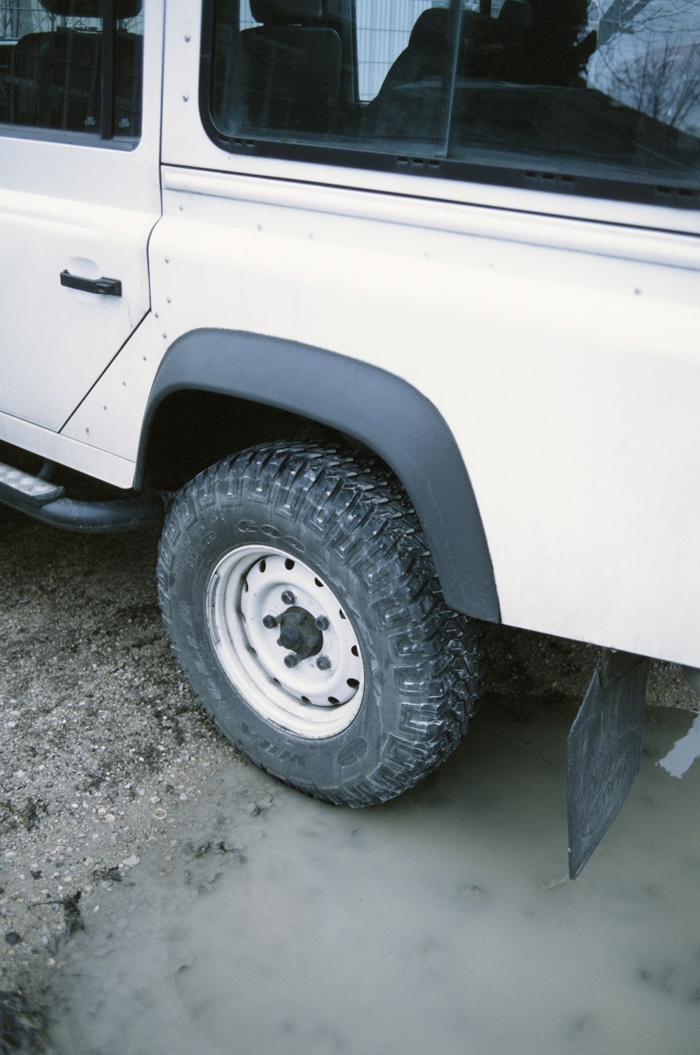 white car with black tire